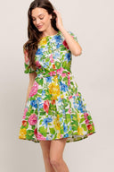 
A printed woven mini dress featuring round neckline, short sleeve, hidden placket, self belt and ruffle hem

Details:

Self : 100% Cotton

Size &amp; Fit

- Model is 5`8" And Wearing Size Small
- Measurements Taken From Size Small
- Approx. Length: 35" Flying Tomato