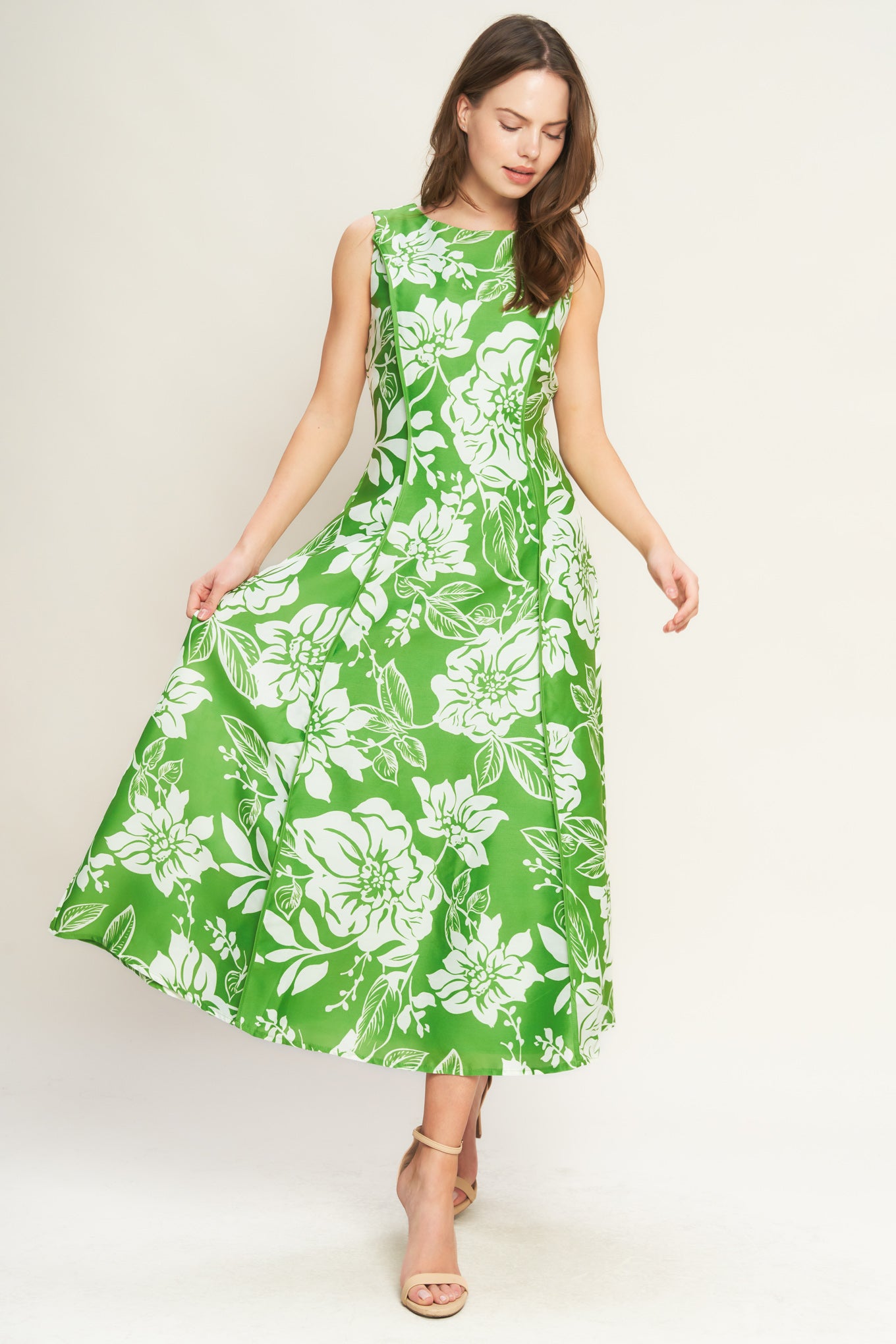 A printed woven midi dress featuring round neckline, sleeveless, solid piping detail, circle skirt and back zipper closure

Details:

Self : 100% Polyester
Lining : 100% Polyester

Size &amp; Fit

- Model is 5`8" And Wearing Size Small
- Measurements Taken From Size Small
- Approx. Length: 53" FLYING TOMATO