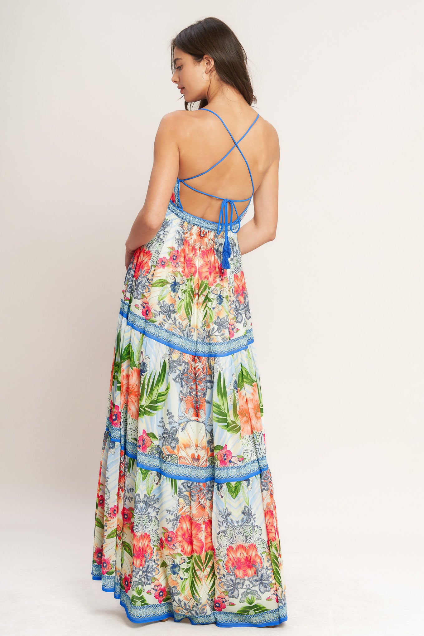 
A printed woven maxi dress featuring cami top, waist yoke, tiered skirt, open back with tie and smocked back waist band

Details:

Self : 100% Polyester
Lining : 100% Polyester

Size &amp; Fit

- Model is 5`8" And Wearing Size Small
- Measurements Taken From Size Small
- Approx. Length: 64" Flying Tomato