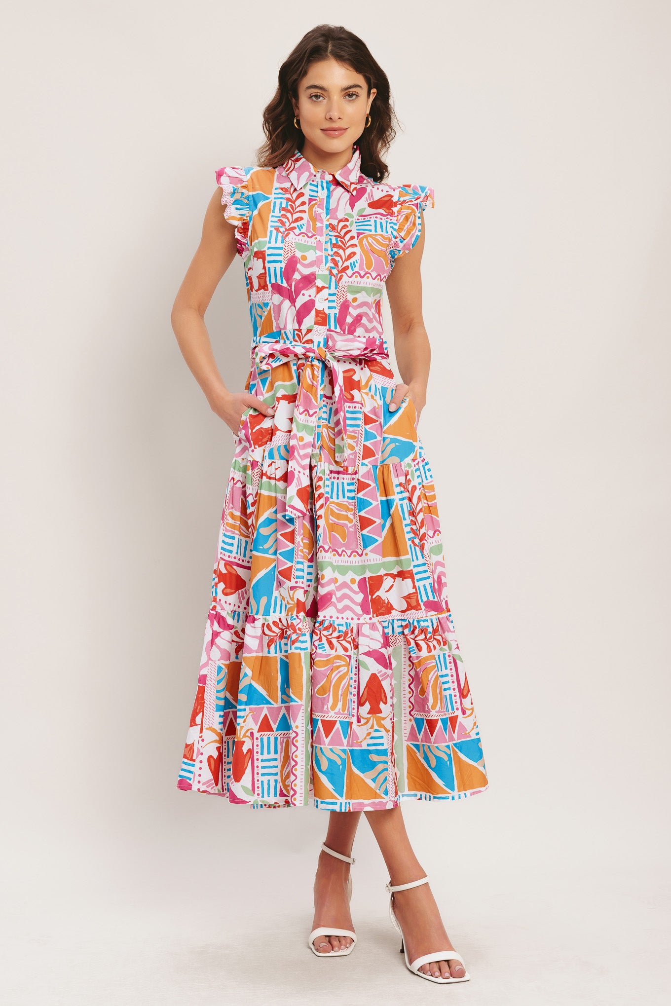 
A printed woven midi dress featuring collar, short ruffle sleeve, button down, self sash tie and tier skirt

Details:

Self : 100% Cotton

Size &amp; Fit

- Model is 5`8" And Wearing Size Small
- Measurements Taken From Size Small
- Approx. Length: 52"