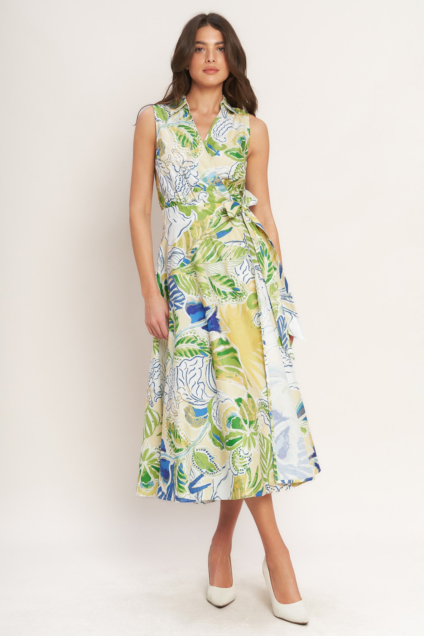 
A printed woven midi dress featuring collar, surplice neckline, sleeveless, true wrap and side tie

Details:

Self : 100% Cotton

Size &amp; Fit

- Model is 5`8" And Wearing Size Small
- Measurements Taken From Size Small
- Approx. Length: 52" FLYING TOMATO