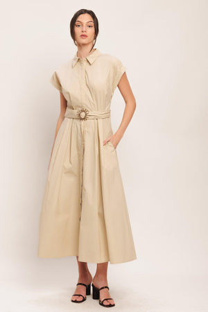 A solid woven midi dress featuring collar, cuffed short sleeve, hidden button down, self belt and full skirt

Details:

Self: 100% Cotton

Size & Fit

-Model is 5`8" And Wearing Size Small
-Measurements Taken From Size Small
-Approx. Length: 52"