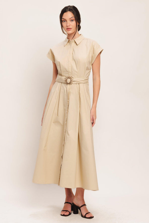 A solid woven midi dress featuring collar, cuffed short sleeve, hidden button down, self belt and full skirt

Details:

Self: 100% Cotton

Size & Fit

-Model is 5`8" And Wearing Size Small
-Measurements Taken From Size Small
-Approx. Length: 52"