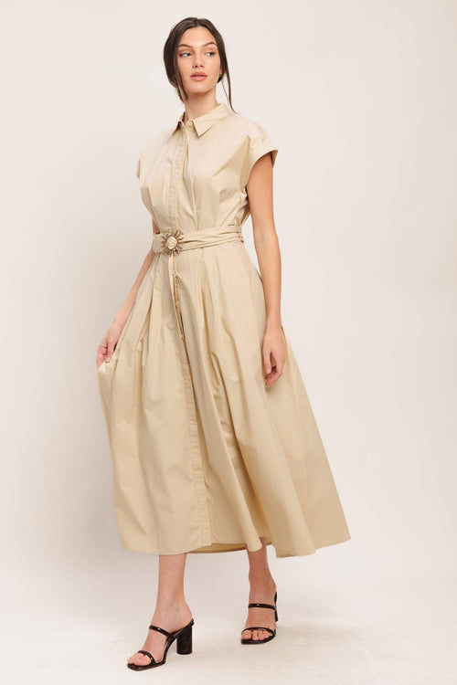 A solid woven midi dress featuring collar, cuffed short sleeve, hidden button down, self belt and full skirt

Details:

Self: 100% Cotton

Size & Fit

-Model is 5`8" And Wearing Size Small
-Measurements Taken From Size Small
-Approx. Length: 52"