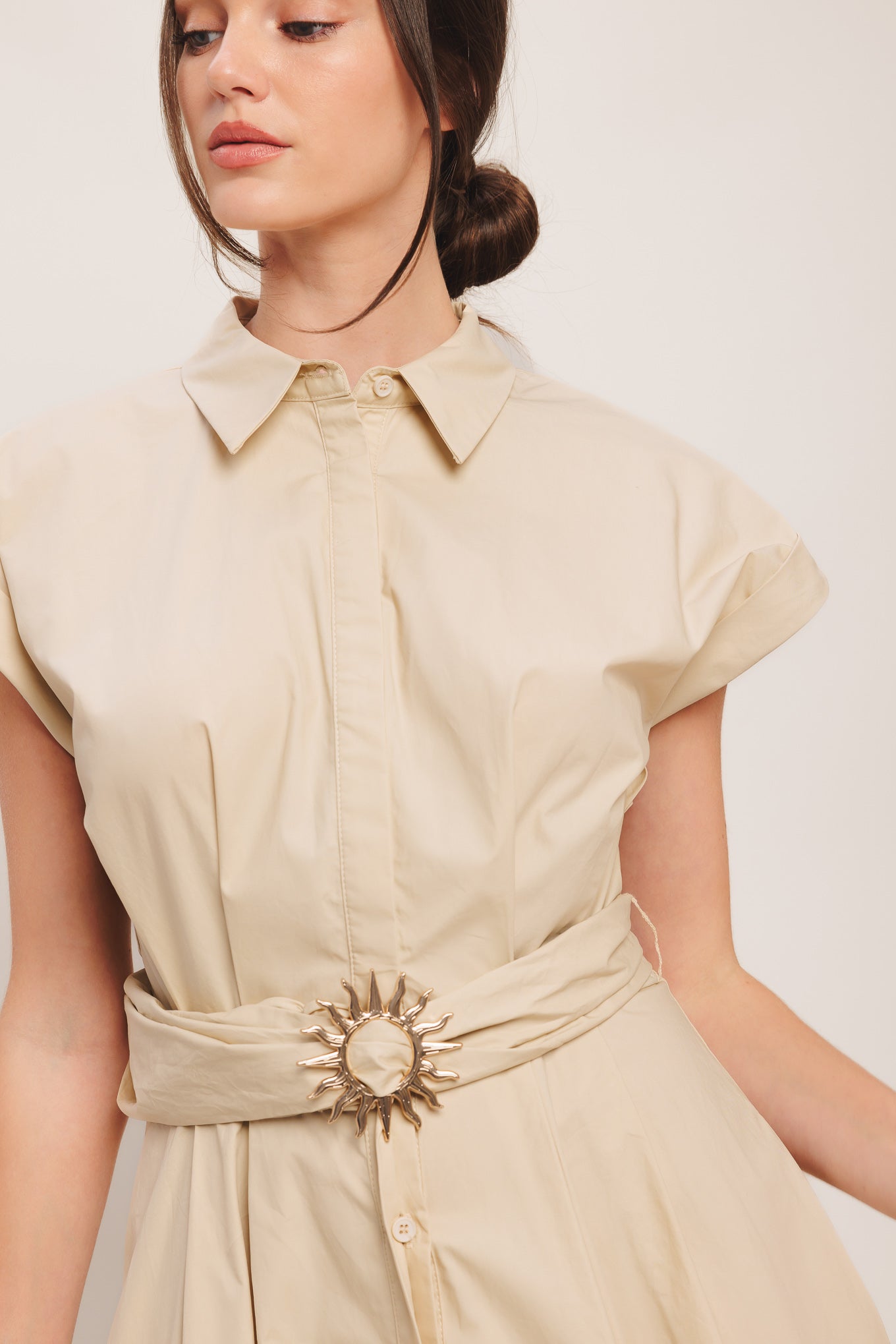 A solid woven midi dress featuring collar, cuffed short sleeve, hidden button down, self belt and full skirt

Details:

Self: 100% Cotton

Size & Fit

-Model is 5`8" And Wearing Size Small
-Measurements Taken From Size Small
-Approx. Length: 52"