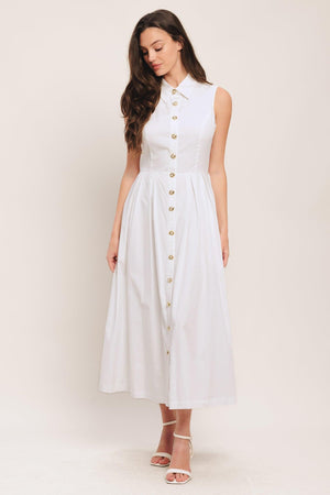 A solid woven midi dress featuring collar, sleeveless, jewel button down, self belt, side pocket and full skirt

Details:

Self: 100% Cotton

Lining: 100% Polyester

Size & Fit

-Model is 5`8" And Wearing Size Small
-Measurements Taken From Size Small
-Approx. Length: 50"