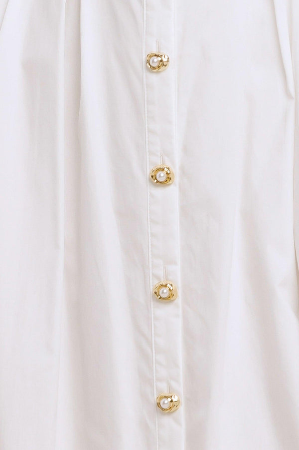 A solid woven midi dress featuring collar, sleeveless, jewel button down, self belt, side pocket and full skirt

Details:

Self: 100% Cotton

Lining: 100% Polyester

Size & Fit

-Model is 5`8" And Wearing Size Small
-Measurements Taken From Size Small
-Approx. Length: 50"