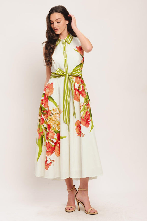 A printed woven midi dress featuring collar, sleeveless, front button down, self sash tie and circle skirt

Details:

Self: 100% Cotton

Lining: 100% Polyester

Size & Fit

-Model is 5`8" And Wearing Size Small
-Measurements Taken From Size Small
-Approx. Length: 50"