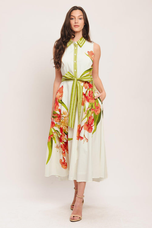 A printed woven midi dress featuring collar, sleeveless, front button down, self sash tie and circle skirt

Details:

Self: 100% Cotton

Lining: 100% Polyester

Size & Fit

-Model is 5`8" And Wearing Size Small
-Measurements Taken From Size Small
-Approx. Length: 50"