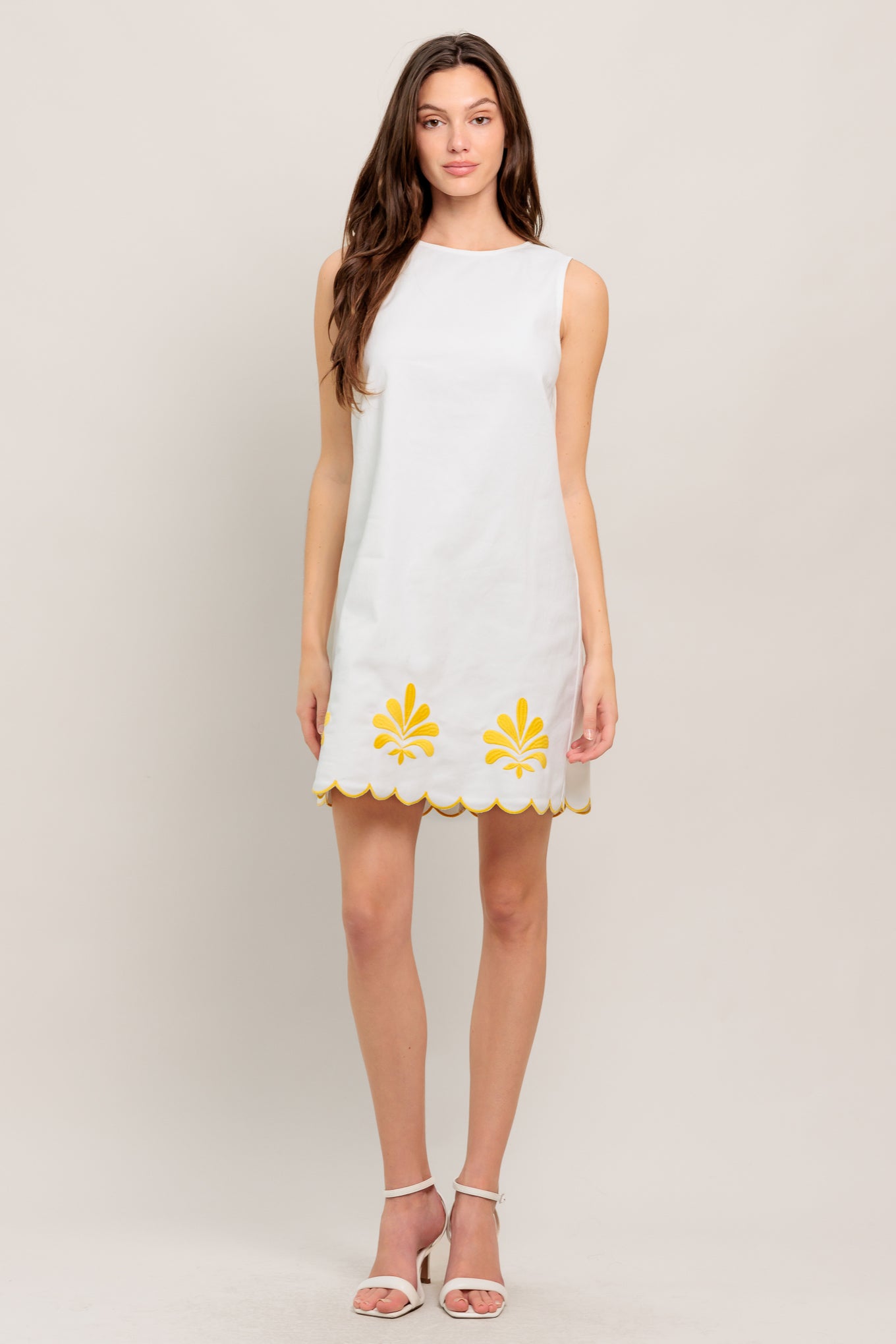 
A solid woven mini dress featuring round neckline, sleeveless, embroidered scallop hem and back zipper closure

Details:

Self : 97% Cotton 3% Spandex

Size &amp; Fit

- Model is 5`8" And Wearing Size Small
- Measurements Taken From Size Small
- Approx. Length: 35" Flying Tomato