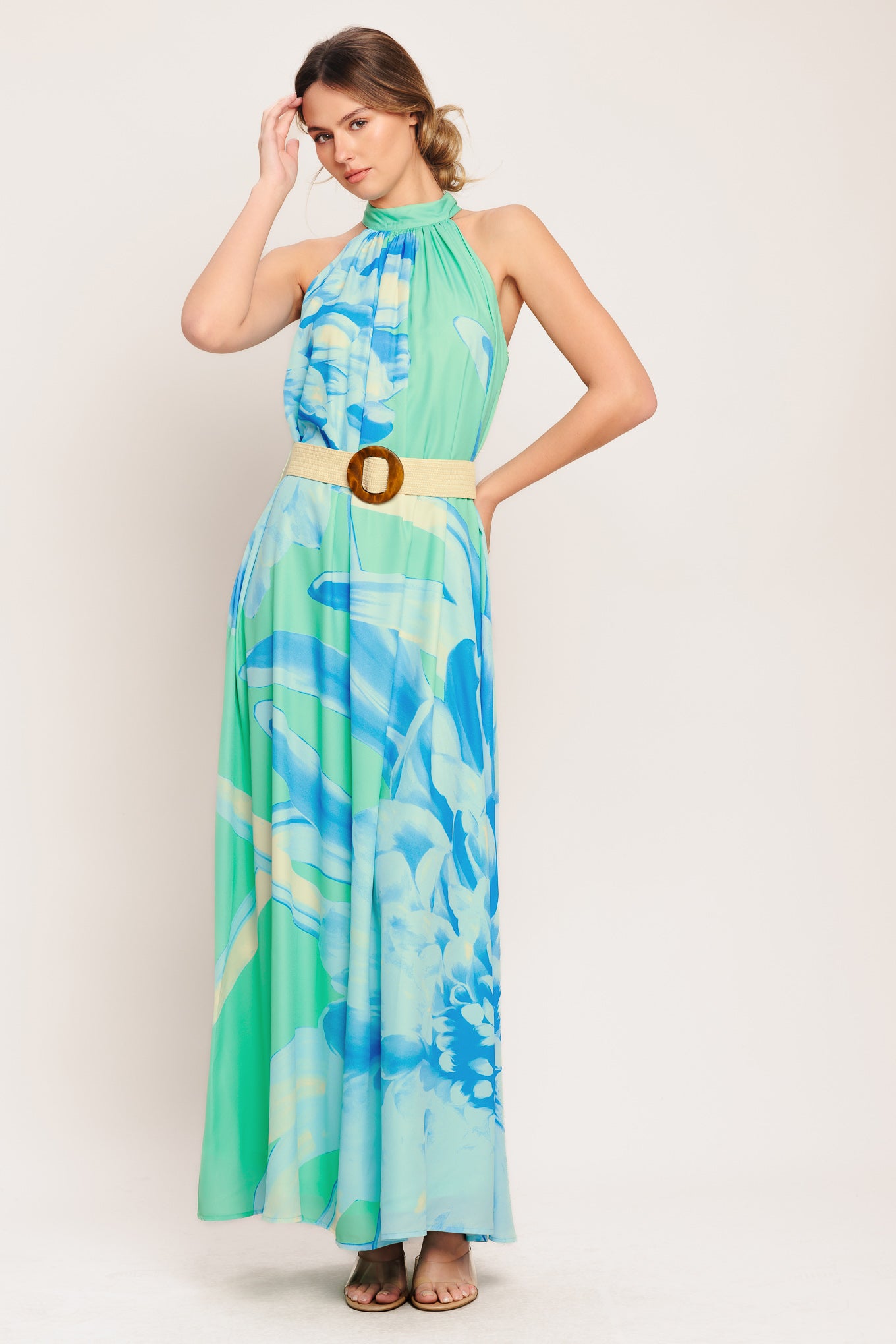 A printed woven maxi dress featuring halter neckline, contrasting belt and back button closure

Details:

Self: 100% Polyester

Lining: 100% Polyester

Size & Fit

-Model is 5`8" And Wearing Size Small
-Measurements Taken From Size Small
-Approx. Length: 61"