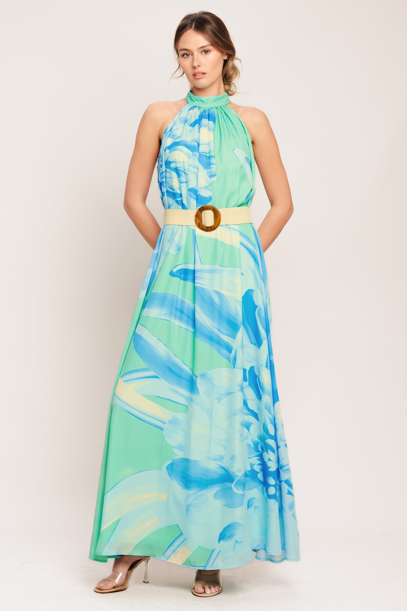 A printed woven maxi dress featuring halter neckline, contrasting belt and back button closure

Details:

Self: 100% Polyester

Lining: 100% Polyester

Size & Fit

-Model is 5`8" And Wearing Size Small
-Measurements Taken From Size Small
-Approx. Length: 61"