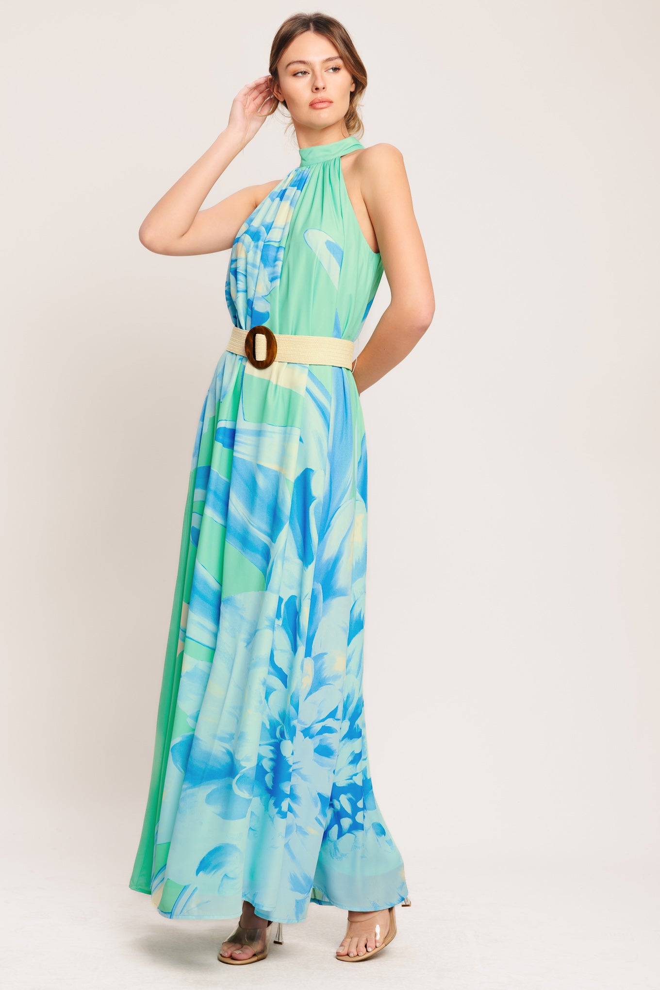 A printed woven maxi dress featuring halter neckline, contrasting belt and back button closure

Details:

Self: 100% Polyester

Lining: 100% Polyester

Size & Fit

-Model is 5`8" And Wearing Size Small
-Measurements Taken From Size Small
-Approx. Length: 61"