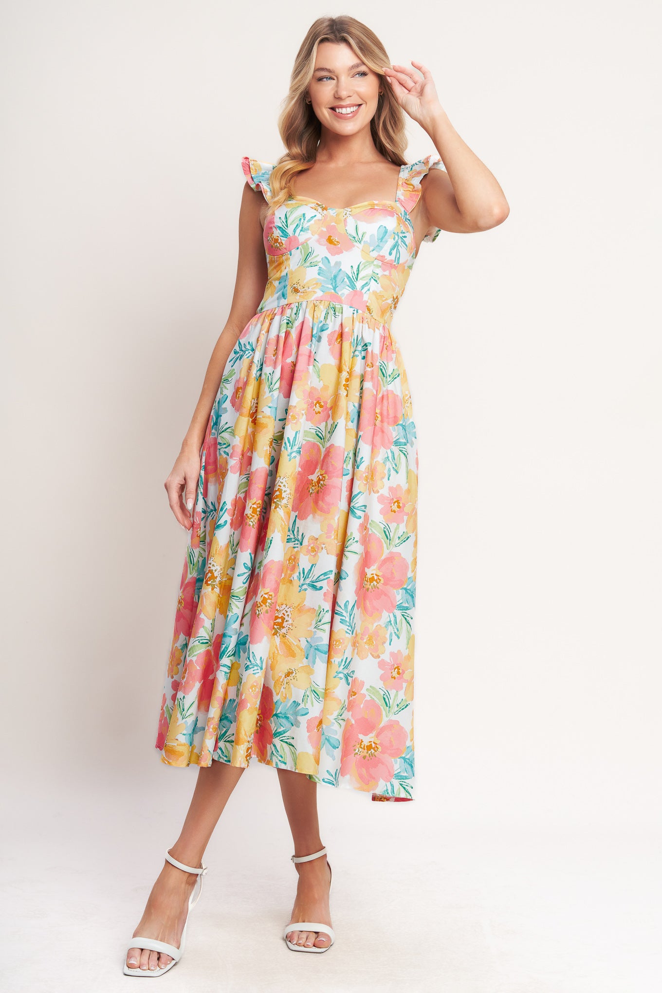 A printed woven midi dress featuring sweetheart neckline, double ruffle sleeve, bra cup, full skirt and smocked back bodice

Details:

Self: 100% Cotton

Lining: 100% Polyester

Size & Fit

-Model is 5`8" And Wearing Size Small
-Measurements Taken From Size Small
-Approx. Length: 48"