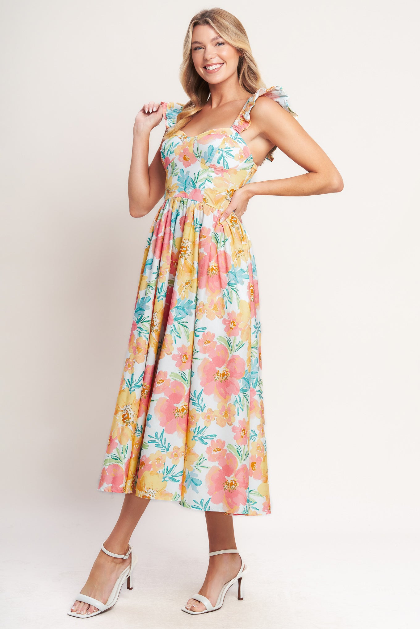 A printed woven midi dress featuring sweetheart neckline, double ruffle sleeve, bra cup, full skirt and smocked back bodice

Details:

Self: 100% Cotton

Lining: 100% Polyester

Size & Fit

-Model is 5`8" And Wearing Size Small
-Measurements Taken From Size Small
-Approx. Length: 48"