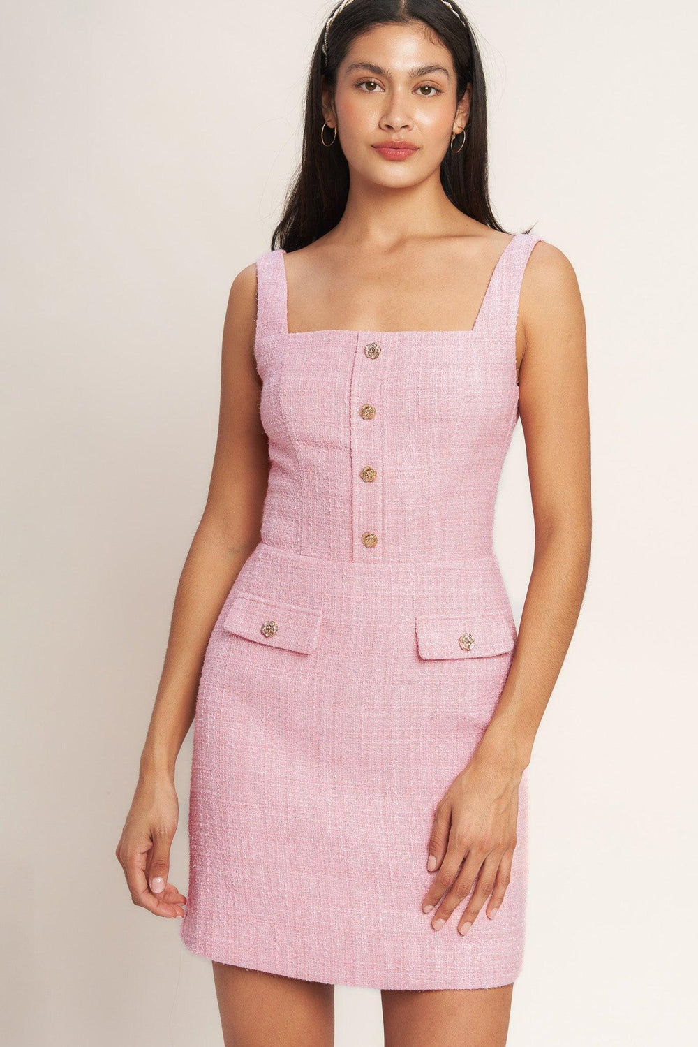 
A woven tweed mini dress featuring square neckline, sleeveless, front button detail and back zipper closure

Details:

Self : 100% Polyester
Lining: 100% Polyester

Size &amp; Fit

- Model is 5`8" And Wearing Size Small
- Measurements Taken From Size Small
- Approx. Length: 35" Flying Tomato
