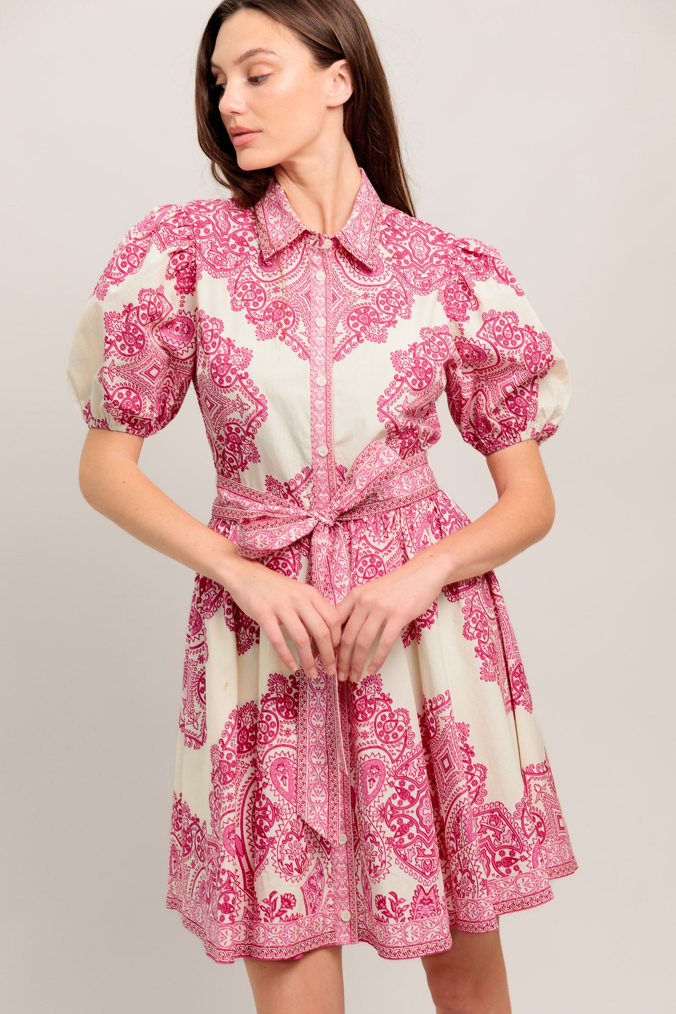 Pink paisley print dress with short sleeves, button front, and waist tie

Details:

Self: 100% Cotton
Lining: 100% Polyester

Size & Fit

- Model is 5`8" And Wearing Size Small
- Measurements Taken From Size Small
- Approx. Length: 37"