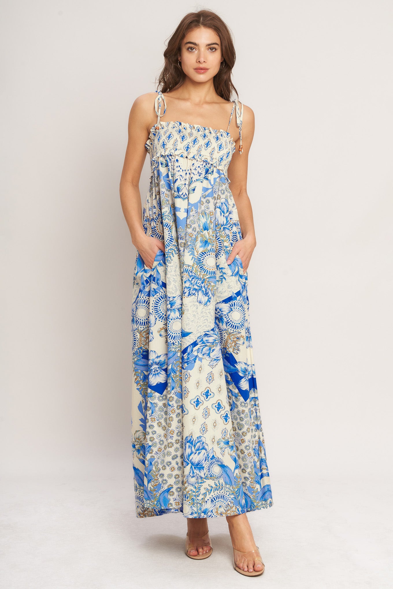 A printed woven maxi dress with smocked bodice and straps