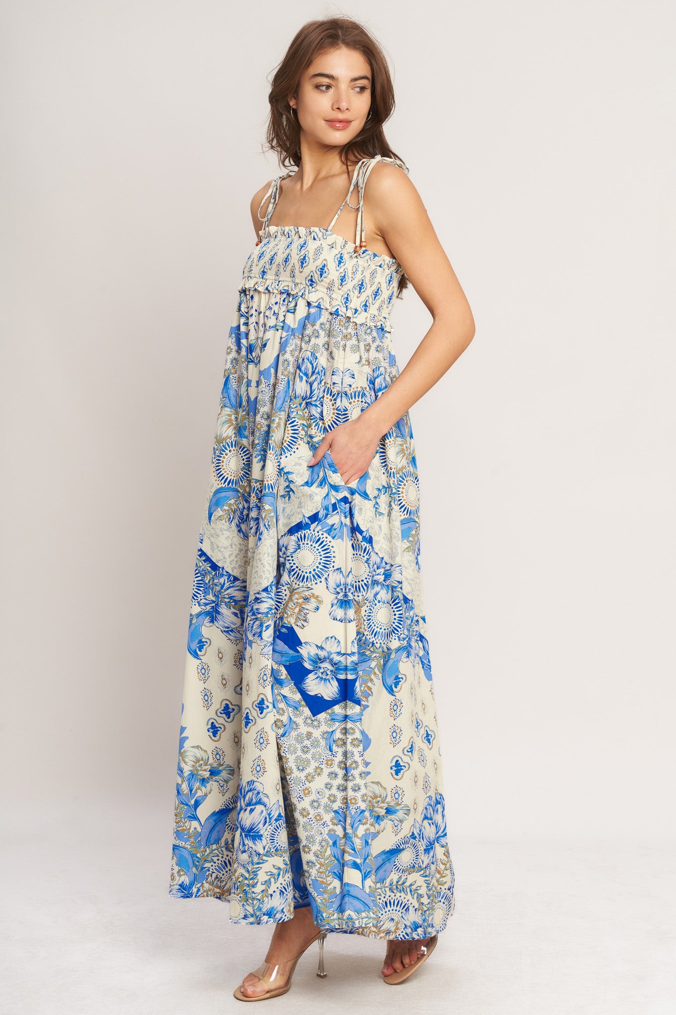 A printed woven maxi dress with smocked bodice and straps