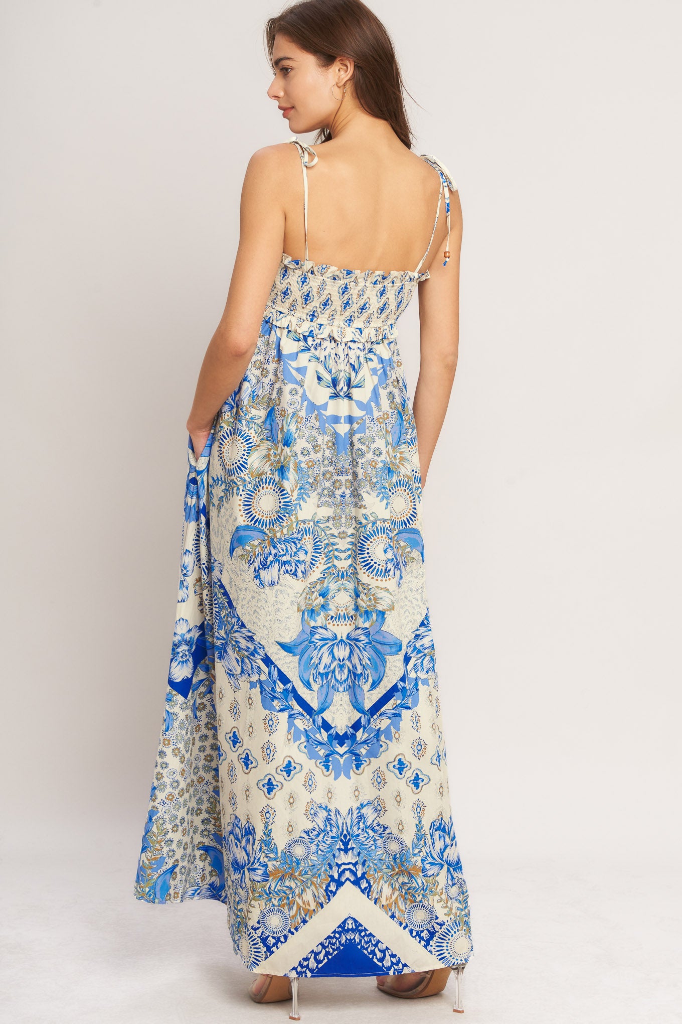 A printed woven maxi dress with smocked bodice and straps