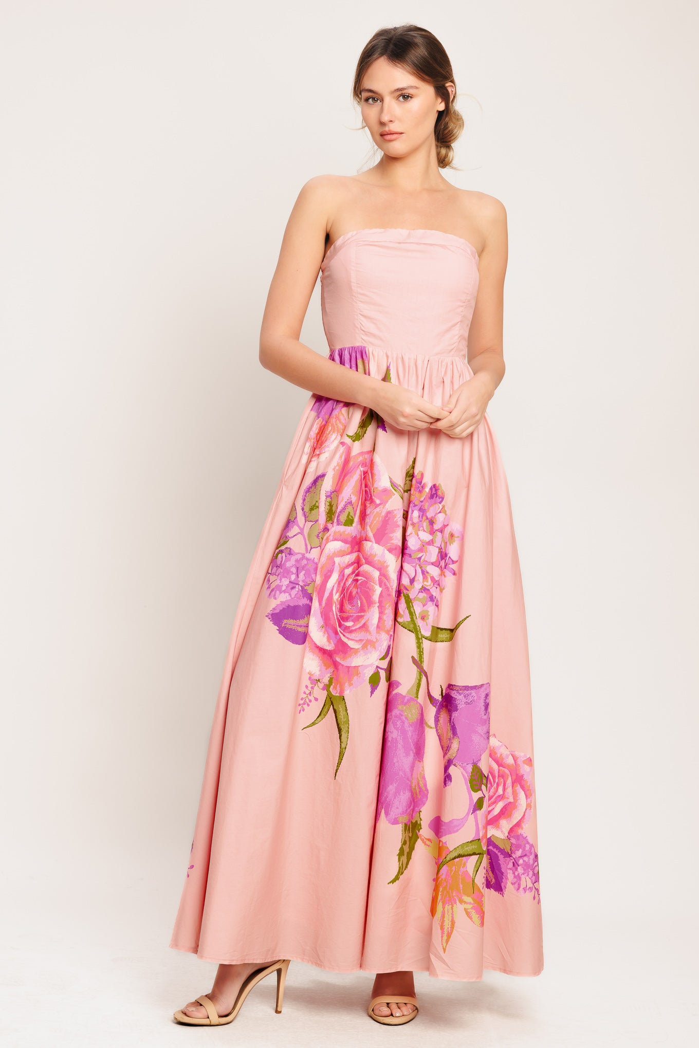 A printed woven maxi dress featuring strapless, full skirt and smocked back bodice

Details:

Self: 100% Cotton

Lining: 100% Polyester

Size & Fit

-Model is 5`8" And Wearing Size Small
-Measurements Taken From Size Small
-Approx. Length: 52"