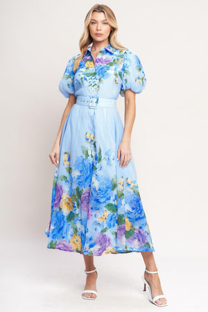A printed woven midi dress featuring collar, short puff sleeve, front button down, self belt and circle skirt

Details:

Self: 100% Polyester

Lining: 100% Polyester

Size & Fit

-Model is 5`8" And Wearing Size Small
-Measurements Taken From Size Small
-Approx. Length: 52"
