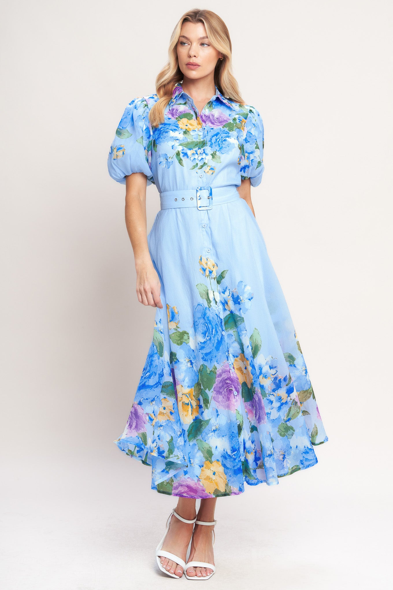 A printed woven midi dress featuring collar, short puff sleeve, front button down, self belt and circle skirt

Details:

Self: 100% Polyester

Lining: 100% Polyester

Size & Fit

-Model is 5`8" And Wearing Size Small
-Measurements Taken From Size Small
-Approx. Length: 52"