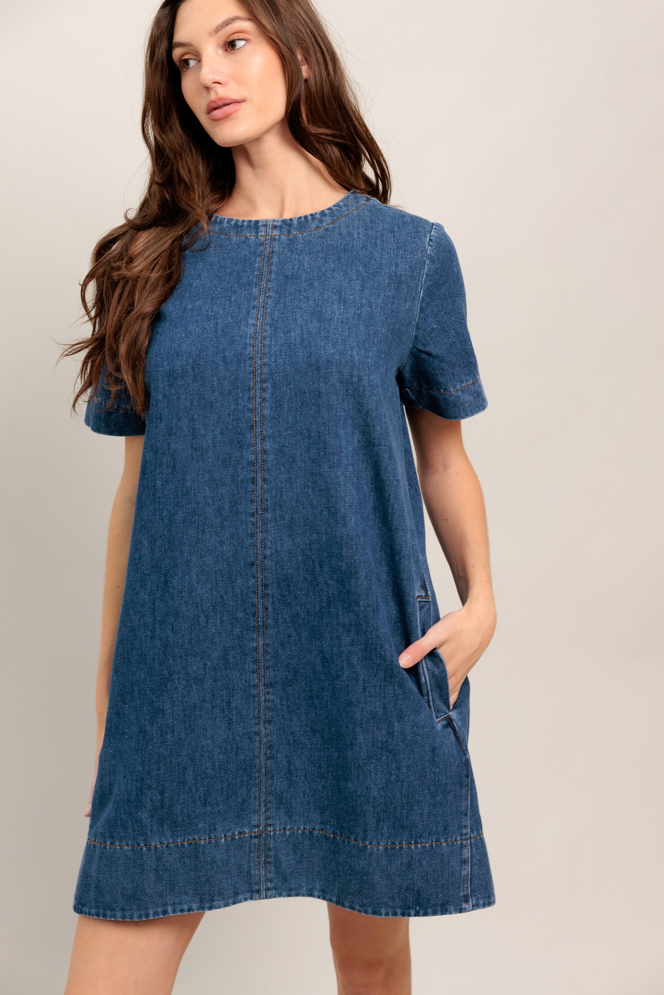 Short-sleeve denim shift dress with front seam and pockets

Details:

Self : 90% Cotton 10% Polyester

Size & Fit

- Model is 5`8" And Wearing Size Small
- Measurements Taken From Size Small
- Approx. Length: 34"