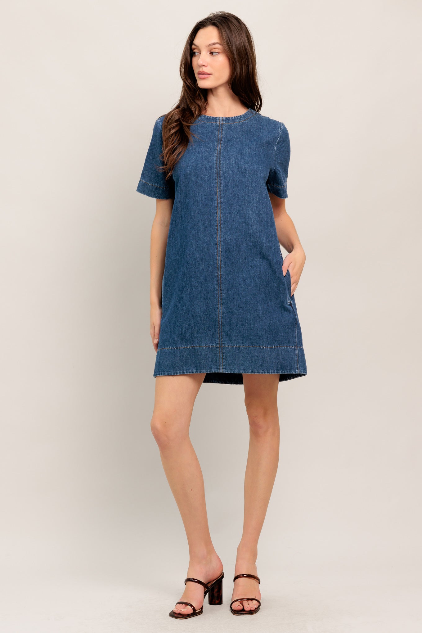Short-sleeve denim shift dress with front seam and pockets

Details:

Self : 90% Cotton 10% Polyester

Size & Fit

- Model is 5`8" And Wearing Size Small
- Measurements Taken From Size Small
- Approx. Length: 34"