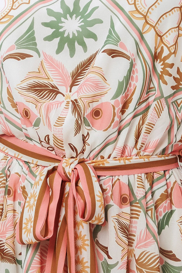 Patterned garment with a belt and floral design | Flying Tomato