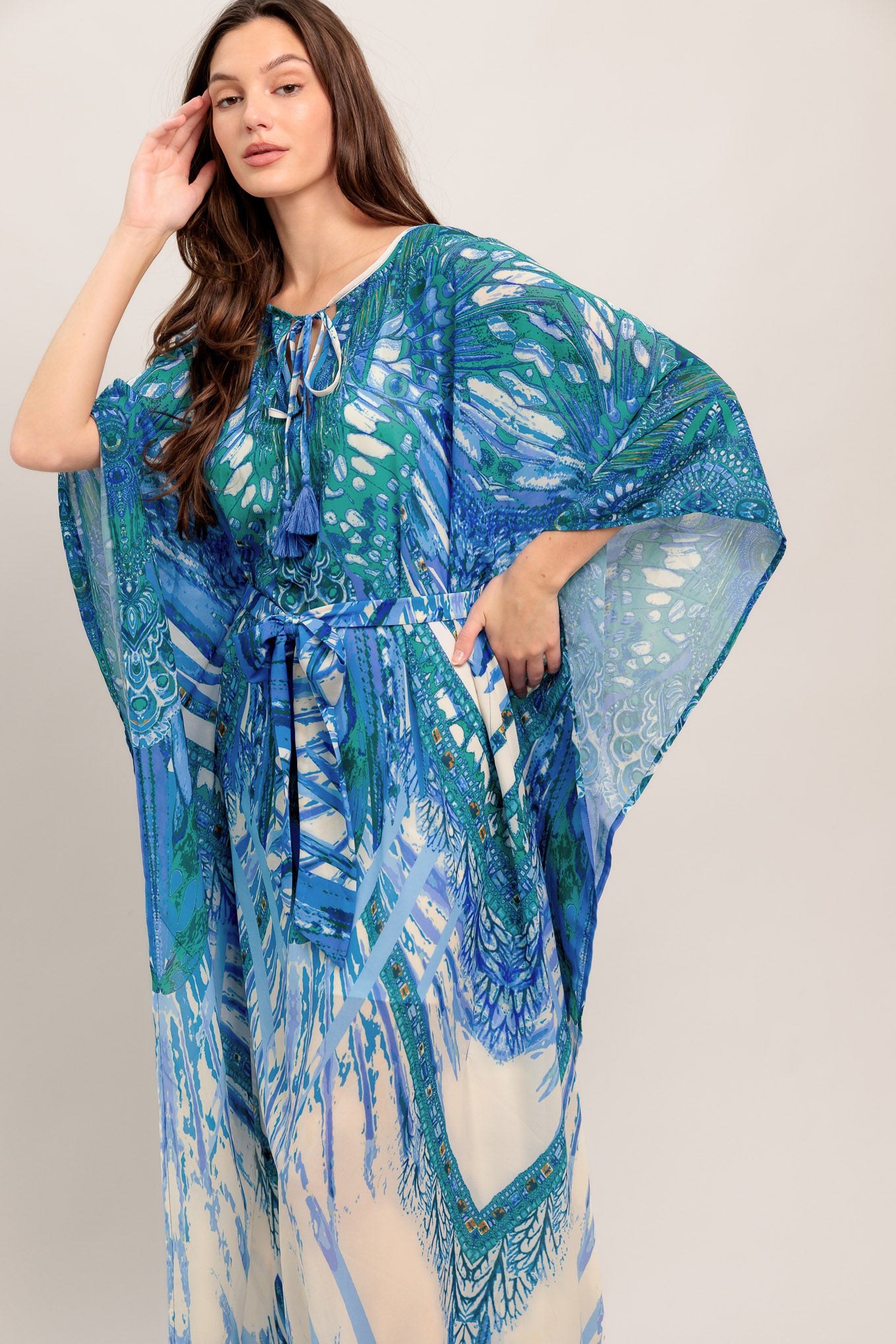
A printed woven kaftan featuring round neckline with front tie/tassel and self sash tie

Details:

Self : 100% Polyester
Lining : 100% Polyester

Size &amp; Fit

- Model is 5`8" And Wearing Size Small
- Measurements Taken From Size Small
- Approx. Length: 60" FLYING TOMATO
