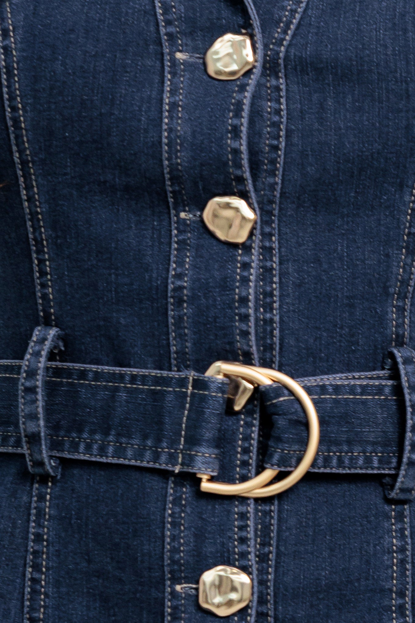 A denim mini dress featuring lapel, sleeveless, drop waistline, front button down and self belt

Details:

Self: 70% Cotton 28% Polyester 2% Spandex

Size & Fit

- Model is 5`8" And Wearing Size Small
- Measurements Taken From Size Small
- Approx. Length: 35"