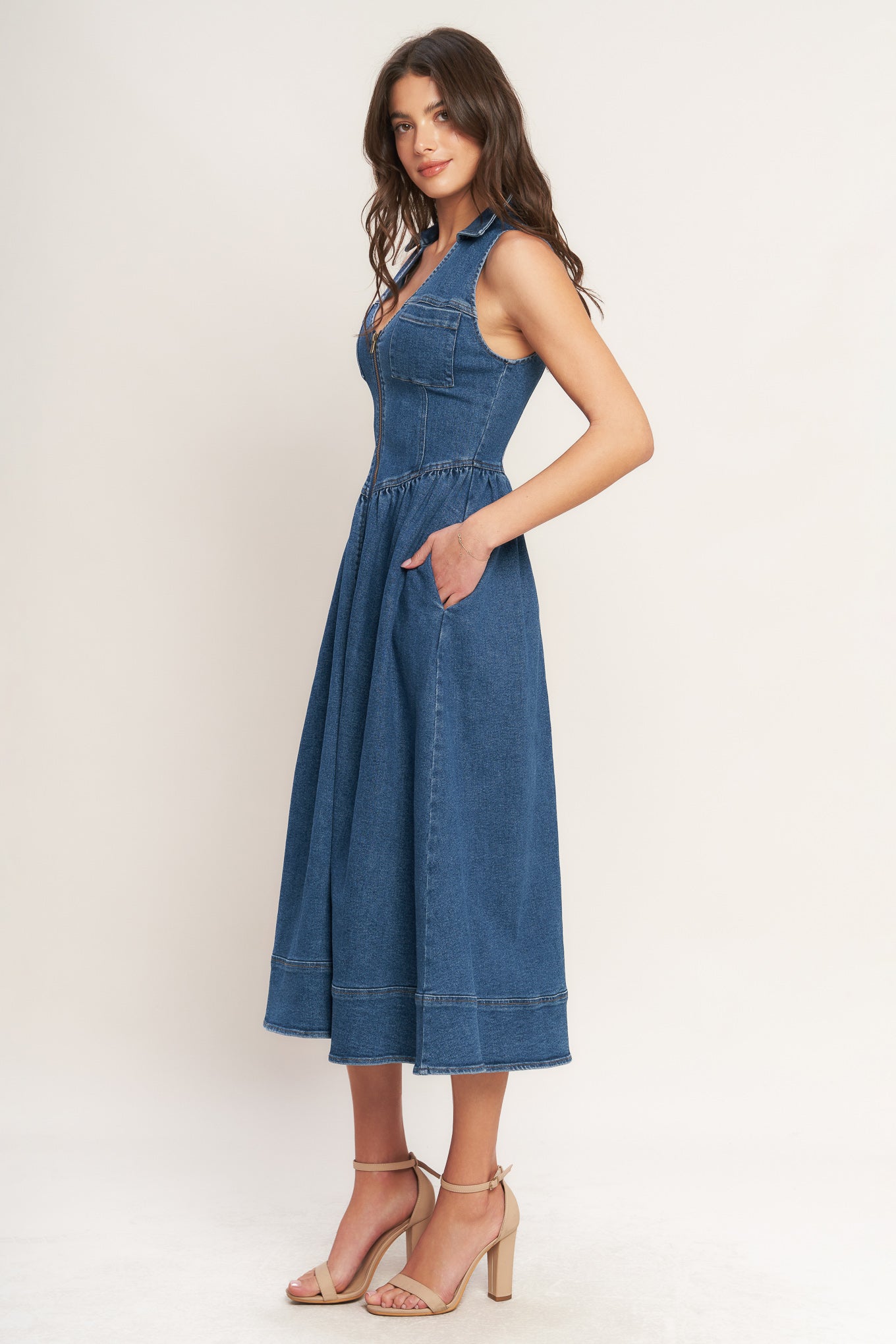 
A washed denim midi dress featuring collar, U neckline, sleeveless, front zipper closure, basque waistline and full skirt with wide hem

Details:

Self : 55% Cotton 33% Polyester 10% Viscose 2% Spandex

Size &amp; Fit

- Model is 5`8" And Wearing Size Small
- Measurements Taken From Size Small
- Approx. Length: 51" FLYING TOMATO