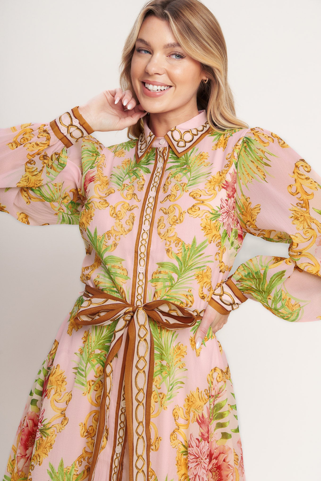 
A printed woven midi dress featuring collar, long sleeve, front button down, self sash and circle skirt

Details:

Self : 100% Polyester
Lining : 100% Polyester

Size &amp; Fit

- Model is 5`8" And Wearing Size Small
- Measurements Taken From Size Small
- Approx. Length: 51"