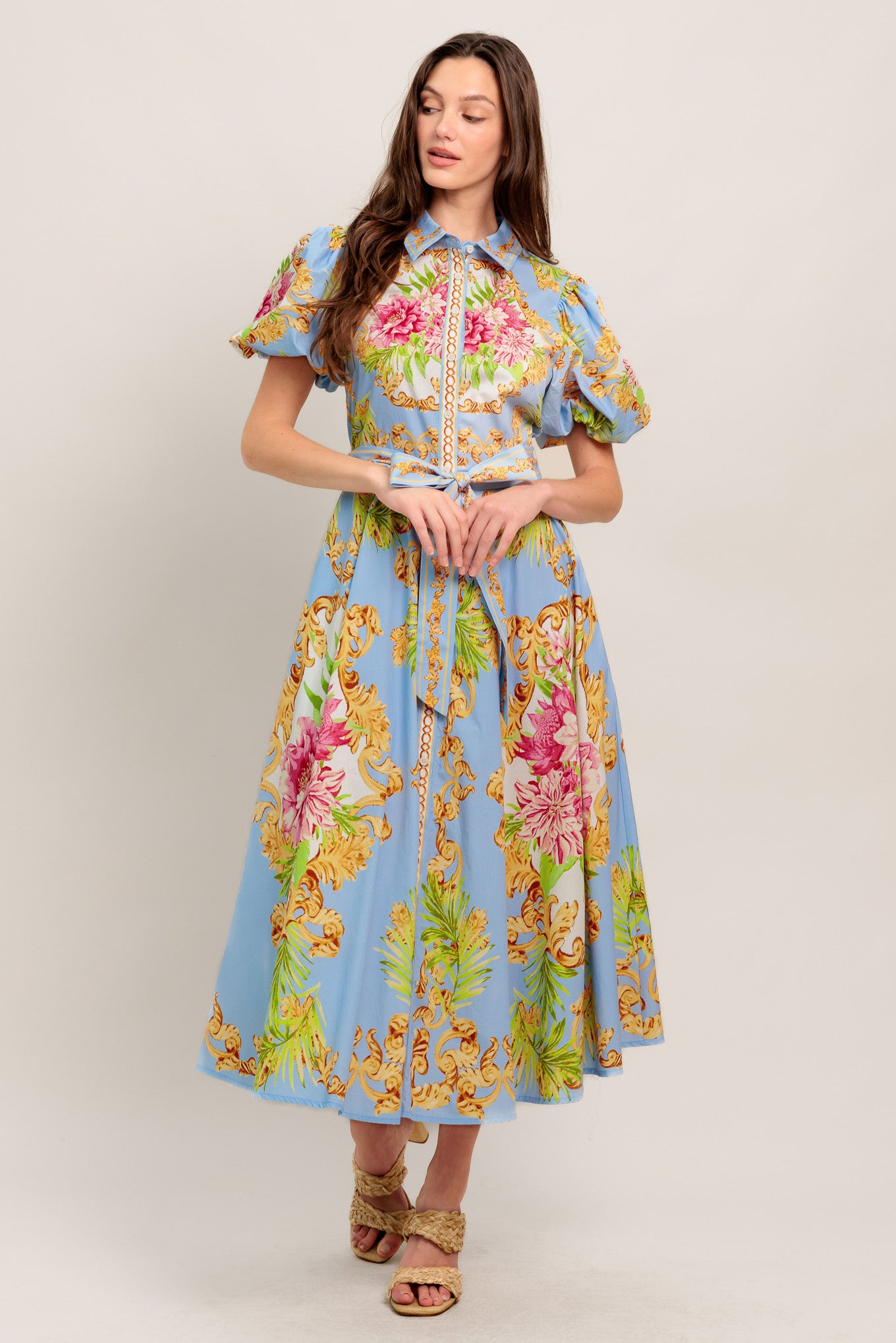 
A printed woven midi dress featuring collar, front button down, short puff sleeve, self sash tie and circle skirt

Details:

Self : 100% Cotton
Lining : 100% Polyester

Size &amp; Fit

- Model is 5`8" And Wearing Size Small
- Measurements Taken From Size Small
- Approx. Length: 51" Flying Tomato