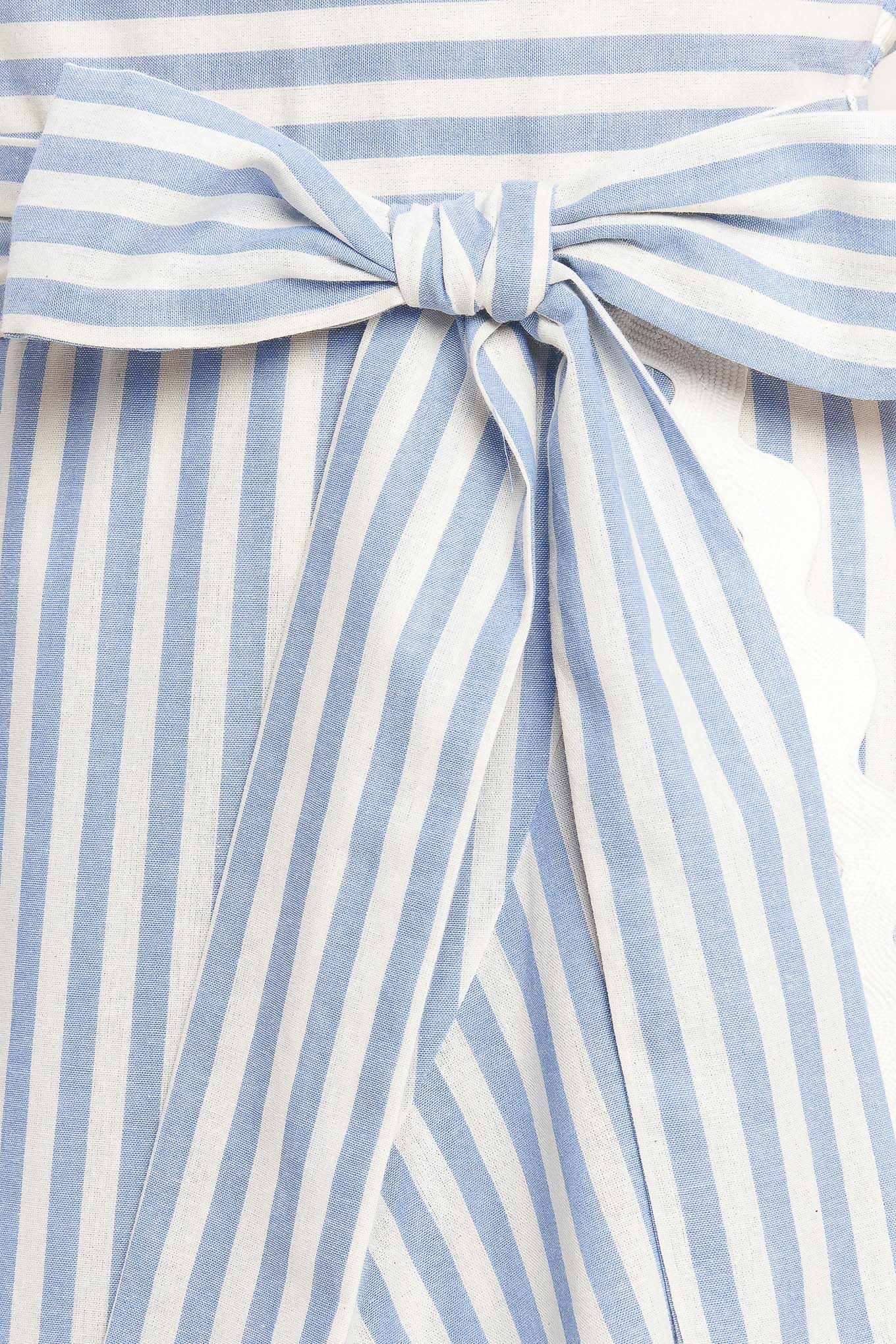 Blue-and-white striped midi dress with delicate straps, a waist bow tie, and a ruffled high-low hem

Details:

Self: 100% Cotton
Lining: 100% Polyester Exclusive of Decoration

Size & Fit

- Model is 5`8" And Wearing Size Small
- Measurements Taken From Size Small
- Approx. Length: 53"