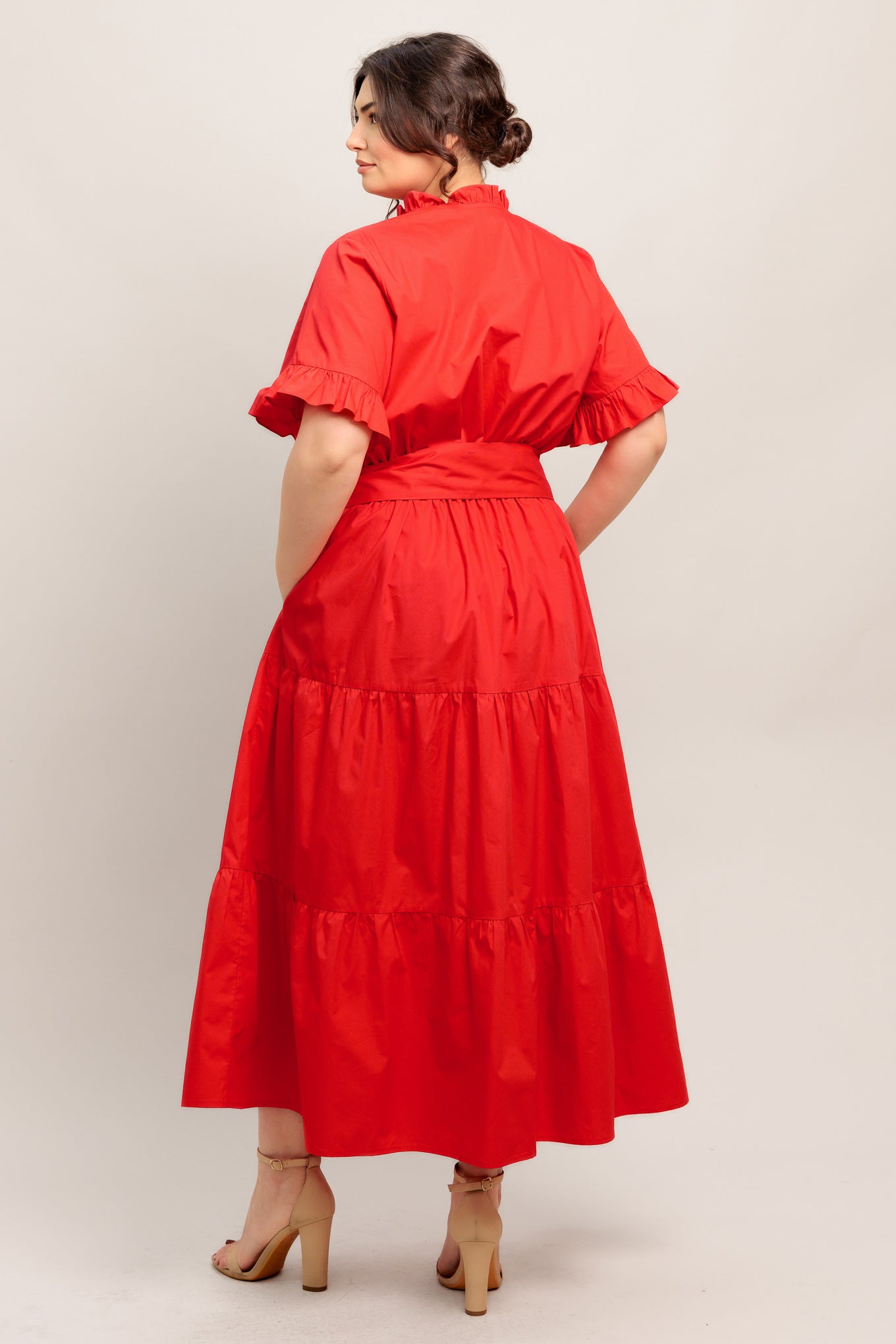 A solid woven midi dress featuring high ruffle neckline, short sleeve with ruffled edge, front button down, self sash tie and tiered skirt

Details:

Self : 100% Cotton
Lining : 100% Polyester

Size &amp; Fit

- Model is 5`8" And Wearing Size Small
- Measurements Taken From Size Small
- Approx. Length: 52" FYING TOMATO