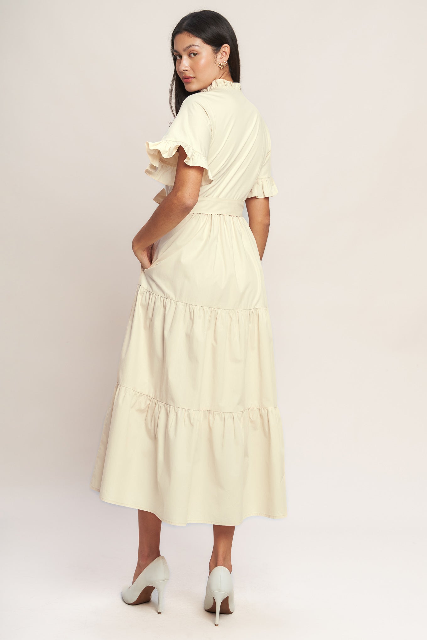 A solid woven midi dress featuring high ruffle neckline, short sleeve with ruffled edge, front button down, self sash tie and tiered skirt

Details:

Self : 100% Cotton
Lining : 100% Polyester

Size &amp; Fit

- Model is 5`8" And Wearing Size Small
- Measurements Taken From Size Small
- Approx. Length: 52" FYING TOMATO
