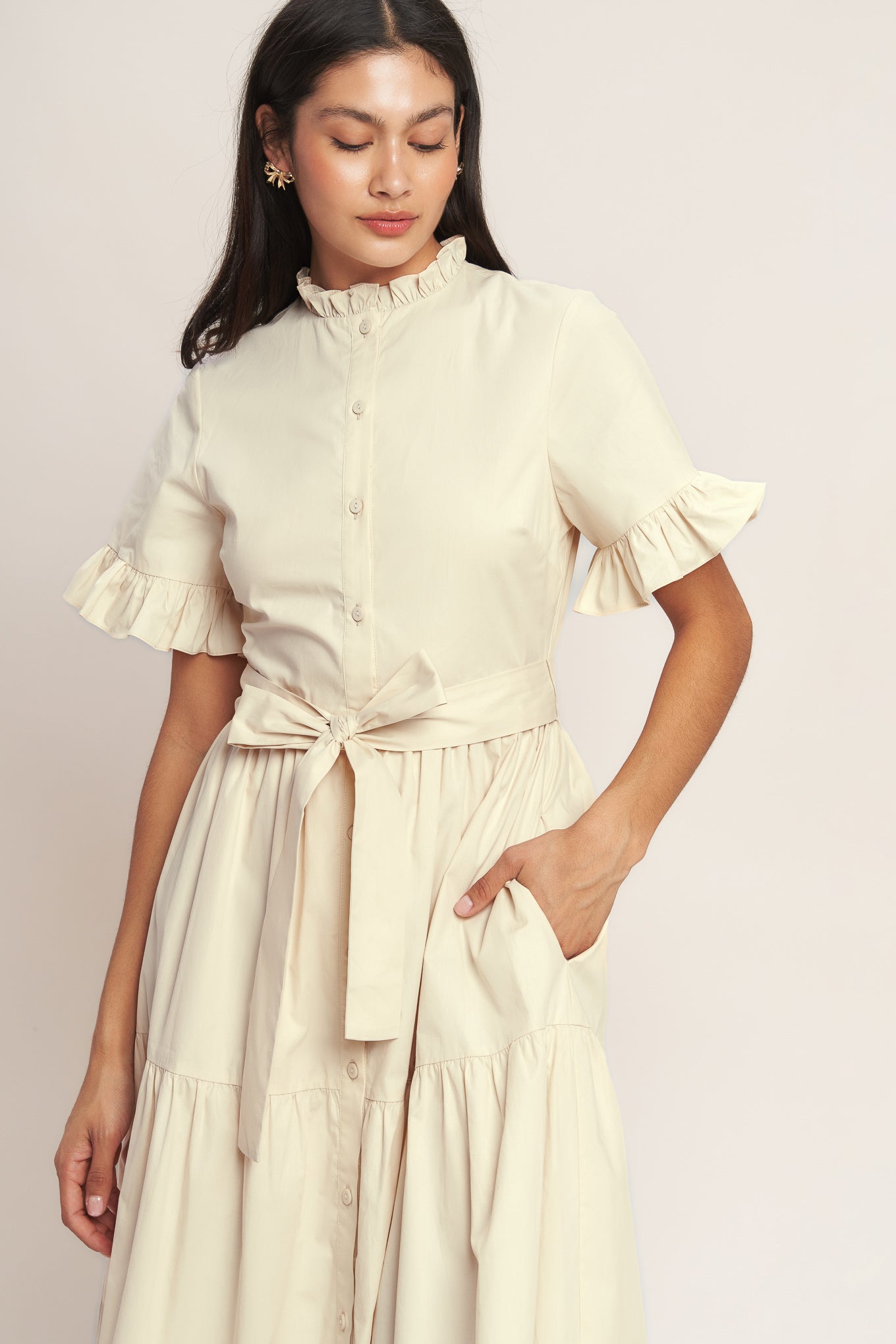 A solid woven midi dress featuring high ruffle neckline, short sleeve with ruffled edge, front button down, self sash tie and tiered skirt

Details:

Self : 100% Cotton
Lining : 100% Polyester

Size &amp; Fit

- Model is 5`8" And Wearing Size Small
- Measurements Taken From Size Small
- Approx. Length: 52" FYING TOMATO