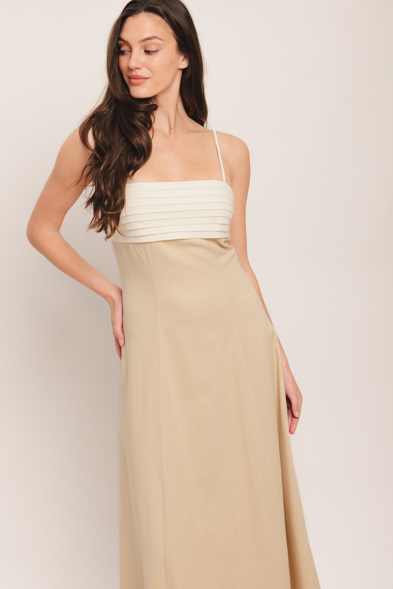 
A solid color block woven midi dress featuring straight neckline, straps, pleated bodice and back zipper detail

Details:

Self : 60% Rayon 30% Linen 10% Polyester
Contrast : 60% Rayon 30% Linen 10% Polyester
Lining : 100% Polyester

Size &amp; Fit

- Model is 5`8" And Wearing Size Small
- Measurements Taken From Size Small
- Approx. Length: 52"