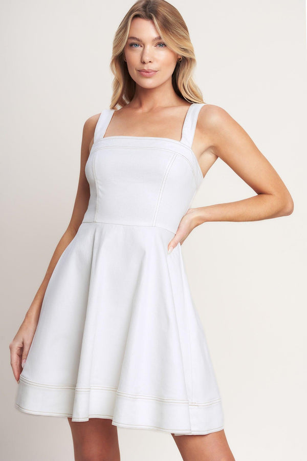 
A solid woven twill mini dress featuring straight neckline, straps, circle skirt and back zipper closure

Details:

Self : 97% Cotton 3% Spandex

Size &amp; Fit

- Model is 5`8" And Wearing Size Small
- Measurements Taken From Size Small
- Approx. Length: 34"