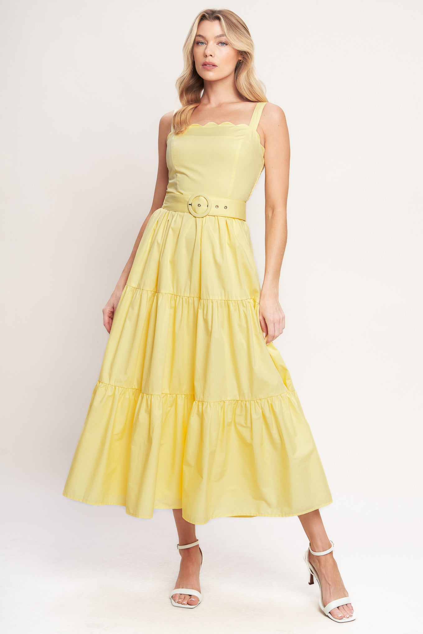 Yellow tiered midi dress with wide straps, a scalloped neckline, and a matching belt for a flattering fit

Details:

Self: 100% Cotton
Lining: 100% Polyester

Size & Fit

- Model is 5`8" And Wearing Size Small
- Measurements Taken From Size Small
- Approx. Length: 52"