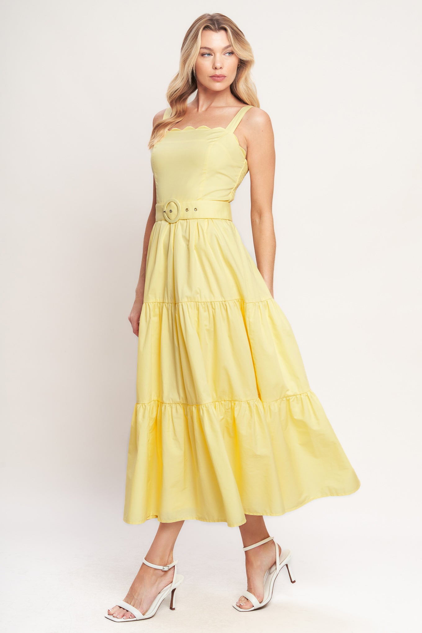 Yellow tiered midi dress with wide straps, a scalloped neckline, and a matching belt for a flattering fit

Details:

Self: 100% Cotton
Lining: 100% Polyester

Size & Fit

- Model is 5`8" And Wearing Size Small
- Measurements Taken From Size Small
- Approx. Length: 52"