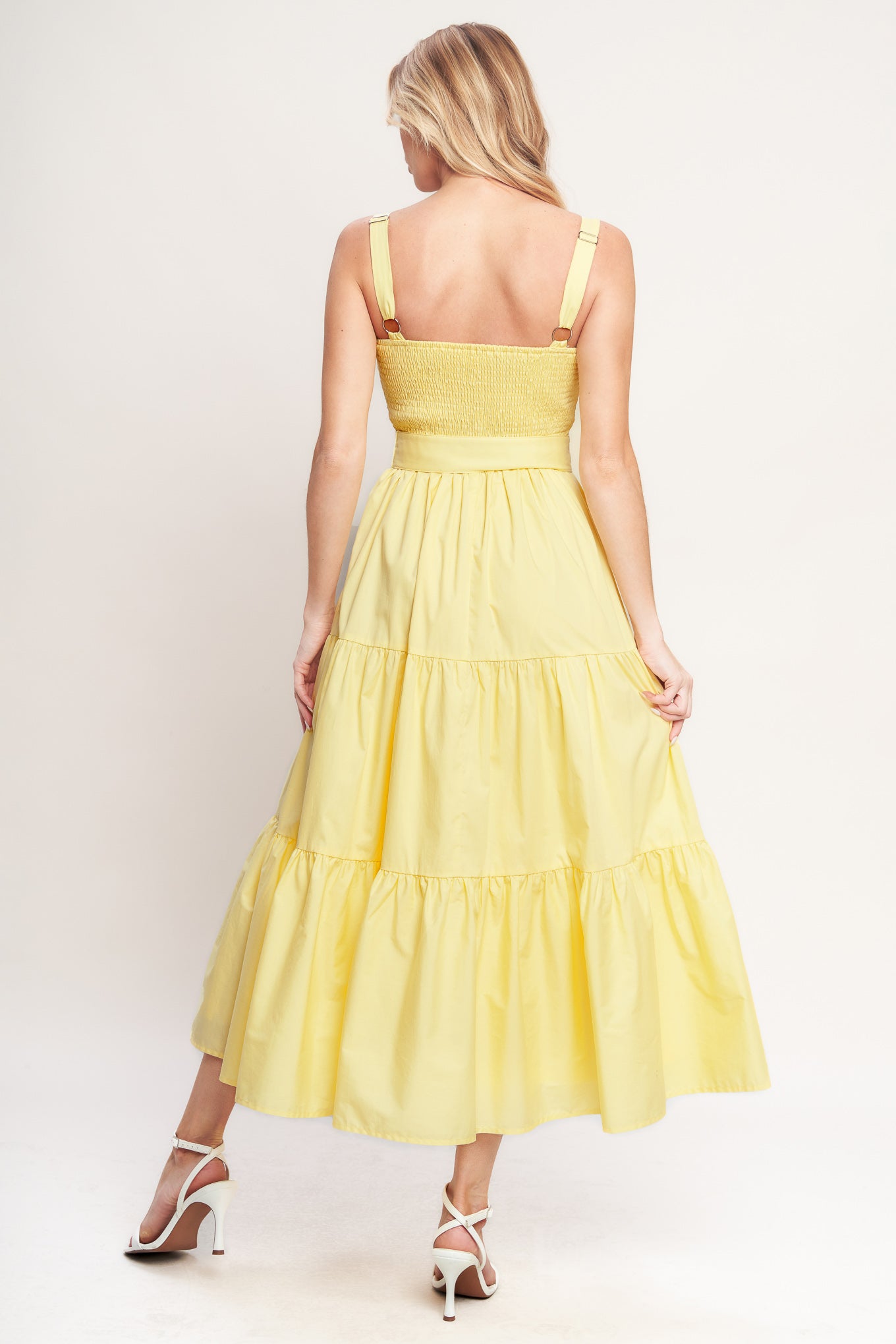 Yellow tiered midi dress with wide straps, a scalloped neckline, and a matching belt for a flattering fit

Details:

Self: 100% Cotton
Lining: 100% Polyester

Size & Fit

- Model is 5`8" And Wearing Size Small
- Measurements Taken From Size Small
- Approx. Length: 52"