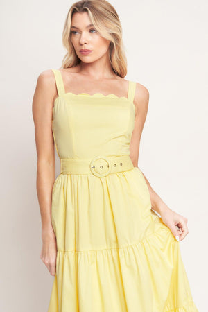 Yellow tiered midi dress with wide straps, a scalloped neckline, and a matching belt for a flattering fit

Details:

Self: 100% Cotton
Lining: 100% Polyester

Size & Fit

- Model is 5`8" And Wearing Size Small
- Measurements Taken From Size Small
- Approx. Length: 52"