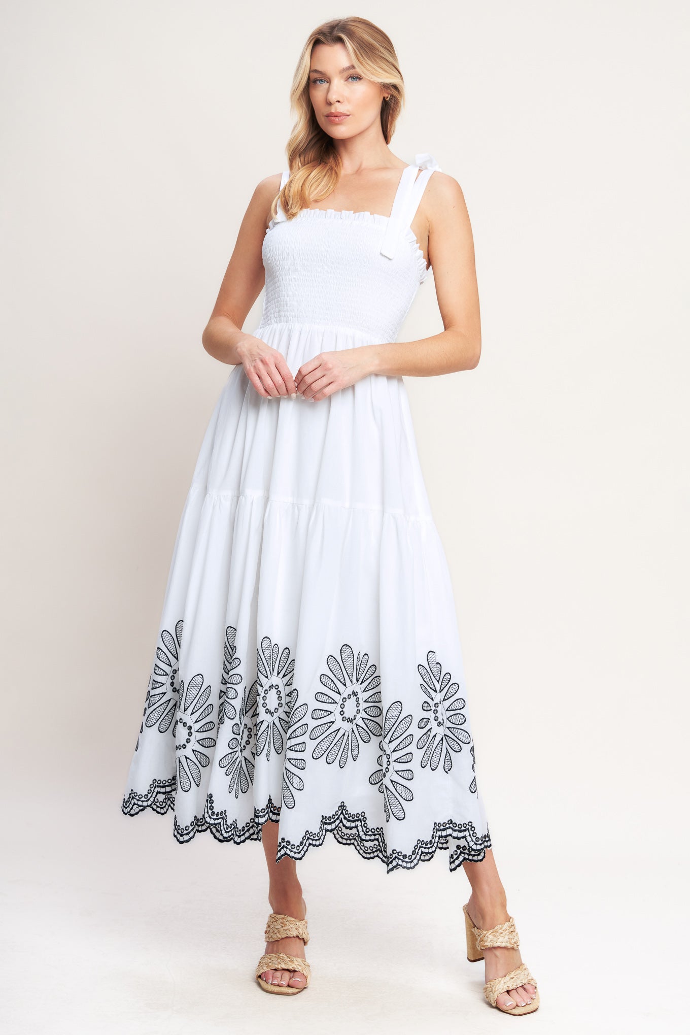 A solid woven midi dress featuring contrasting ruffle edge, shoulder tie and embroidered skirt

Details:

Self: 100% Cotton

Lining: 100% Polyester

Size & Fit

-Model is 5`8" And Wearing Size Small
-Measurements Taken From Size Small
-Approx. Length: 50"