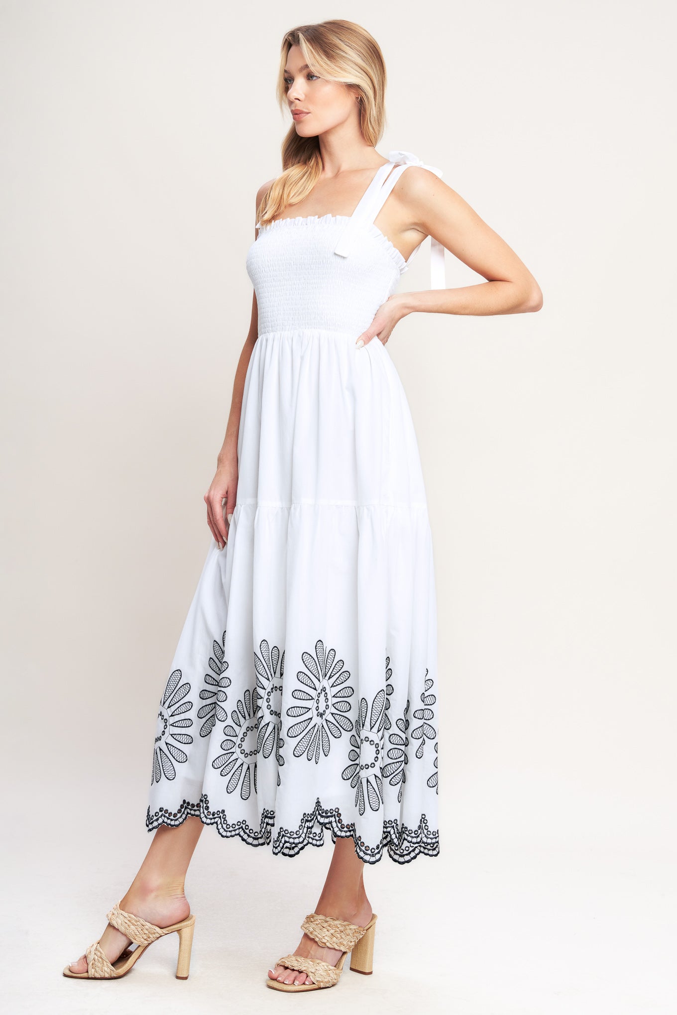 A solid woven midi dress featuring contrasting ruffle edge, shoulder tie and embroidered skirt

Details:

Self: 100% Cotton

Lining: 100% Polyester

Size & Fit

-Model is 5`8" And Wearing Size Small
-Measurements Taken From Size Small
-Approx. Length: 50"
