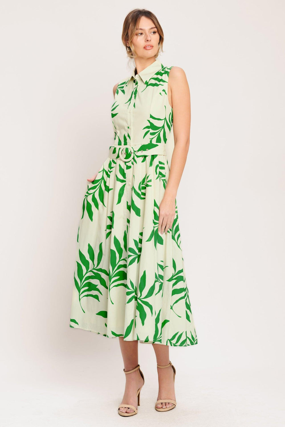 A printed woven midi dress featuring collar, sleeveless, button down, self belt and full skirt

Details:

Self: 100% Cotton

Lining: 100% Polyester

Size & Fit

-Model is 5`8" And Wearing Size Small
-Measurements Taken From Size Small
-Approx. Length: 52"