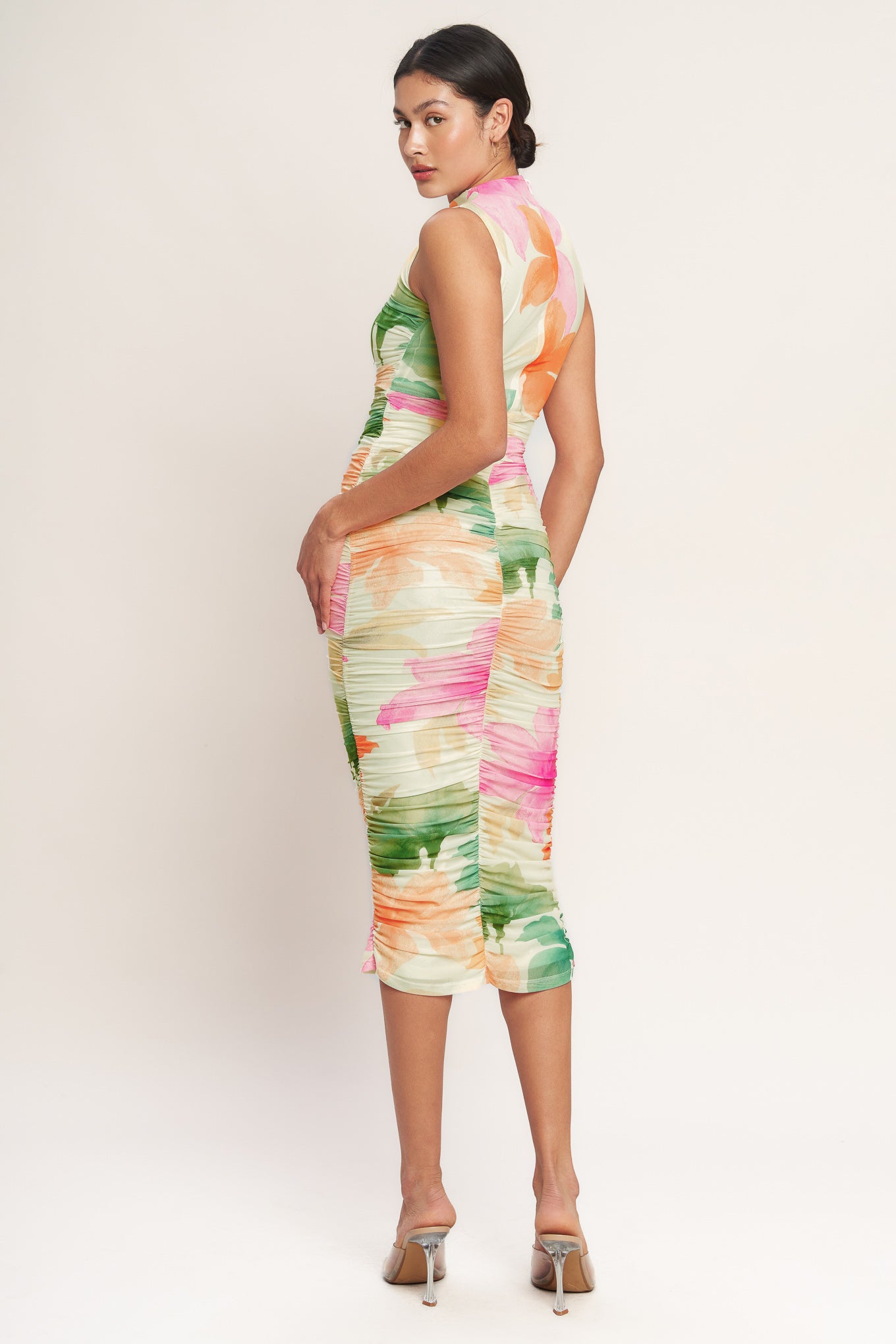
A printed power mesh midi dress featuring tubular neckline, sleeveless, shirred side, body contouring and back zipper closure

Details:

Self : 95% Polyester 5% Spandex
Lining : 100% Polyester

Size &amp; Fit

- Model is 5`8" And Wearing Size Small
- Measurements Taken From Size Small
- Approx. Length: 51" FLYING TOMATO