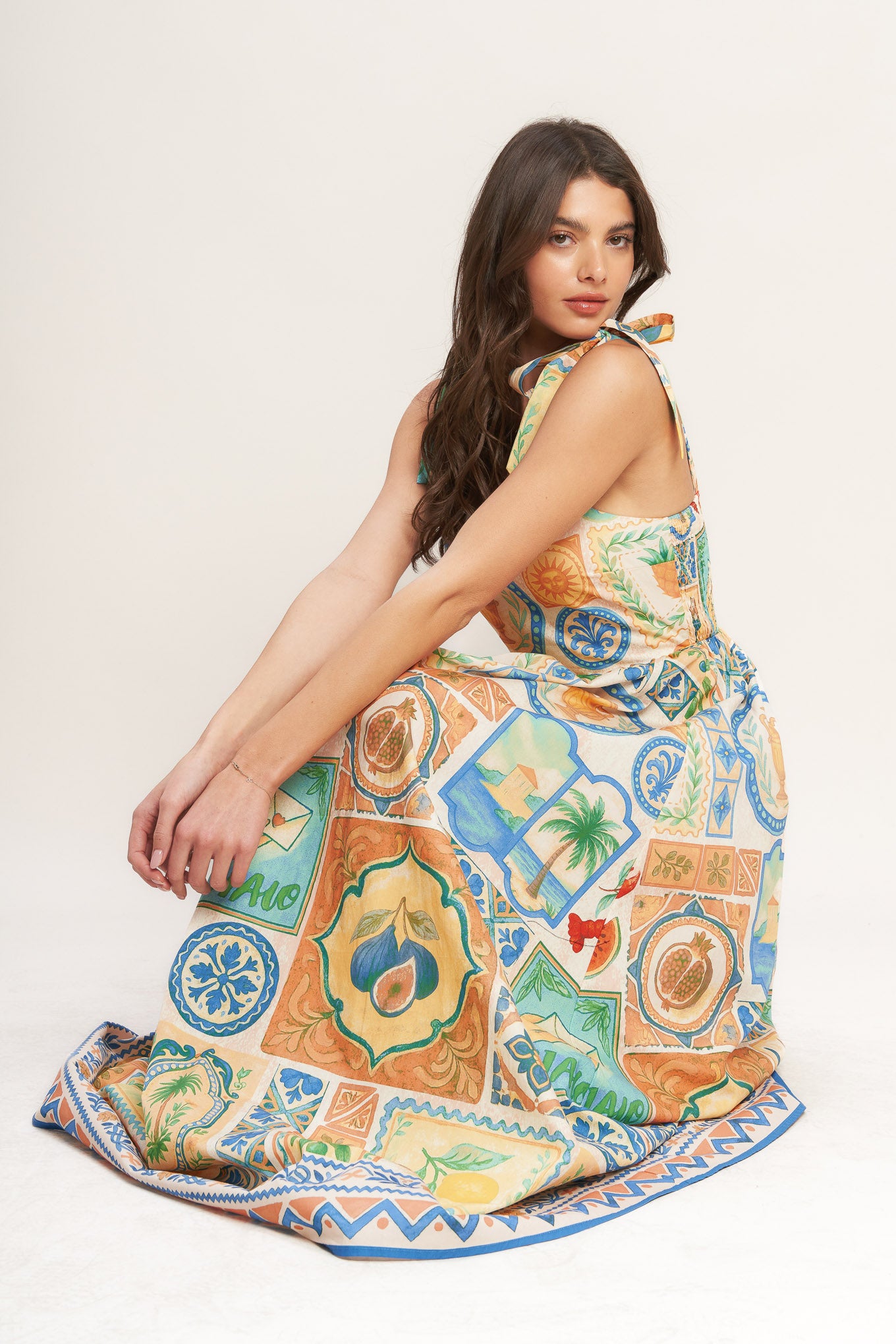 
A printed woven maxi dress featuring straight neckline, shoulder ties and smocked back bodice

Details:

Self : 100% Cotton
Lining : 100% Polyester

Size &amp; Fit

- Model is 5`8" And Wearing Size Small
- Measurements Taken From Size Small
- Approx. Length: 58" FLYING TOMATO
